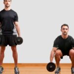 Squatting With Dumbbells